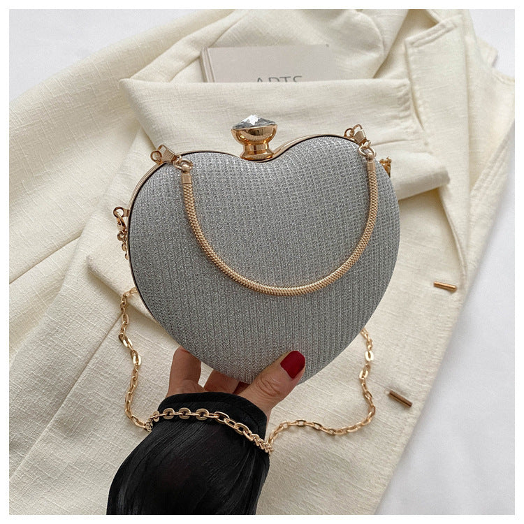 Heart-Shaped Shiny Metal Clutch – Luxury Evening Bag