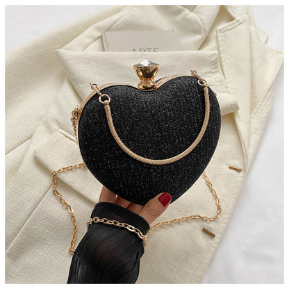 Heart-Shaped Shiny Metal Clutch – Luxury Evening Bag